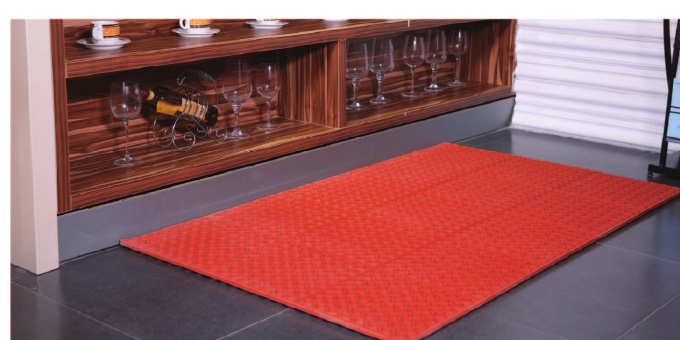 Open-hole mat shown in a commercial interior in the source catalogue
